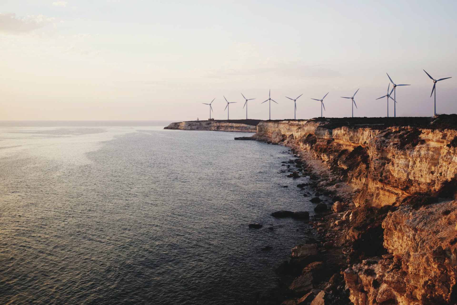 Wind turbines lining coast