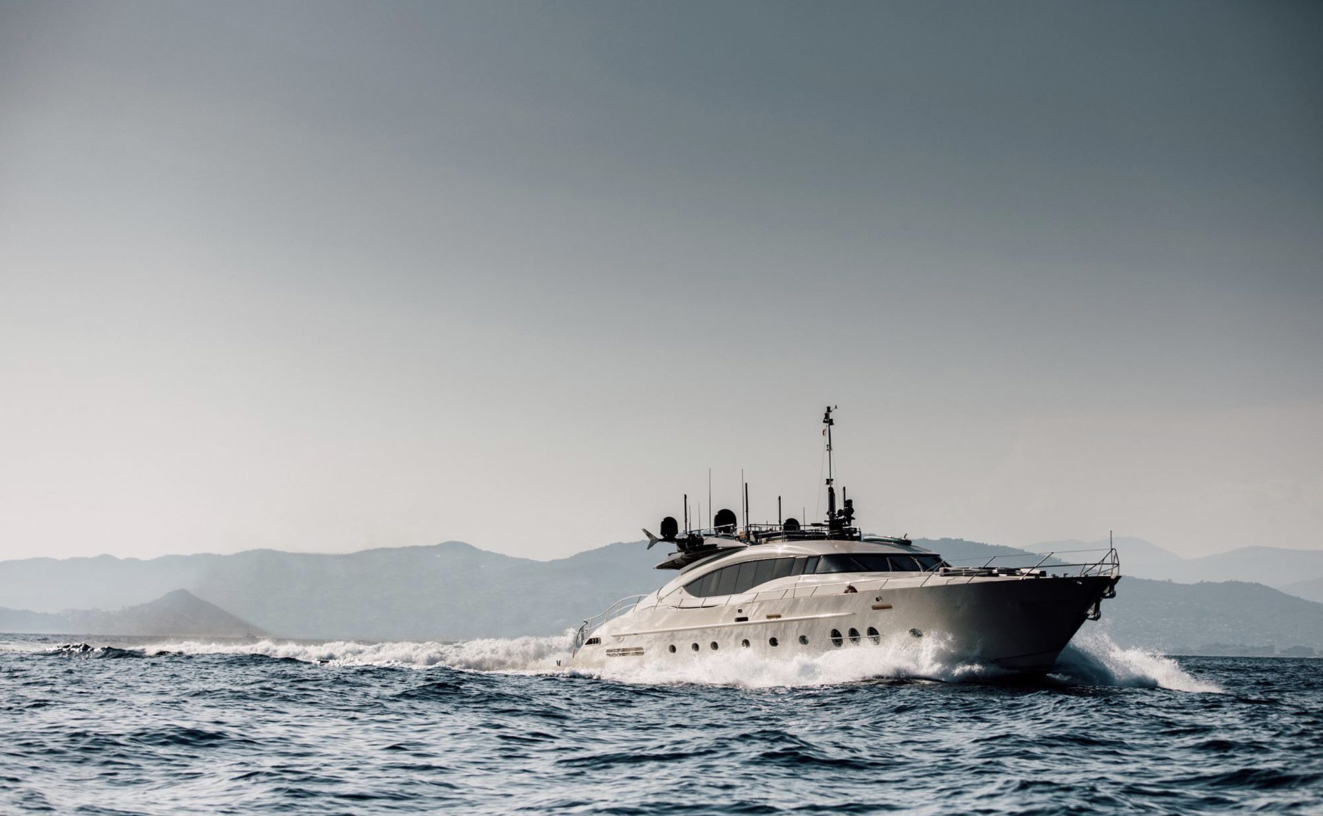 Motor yacht gliding through water