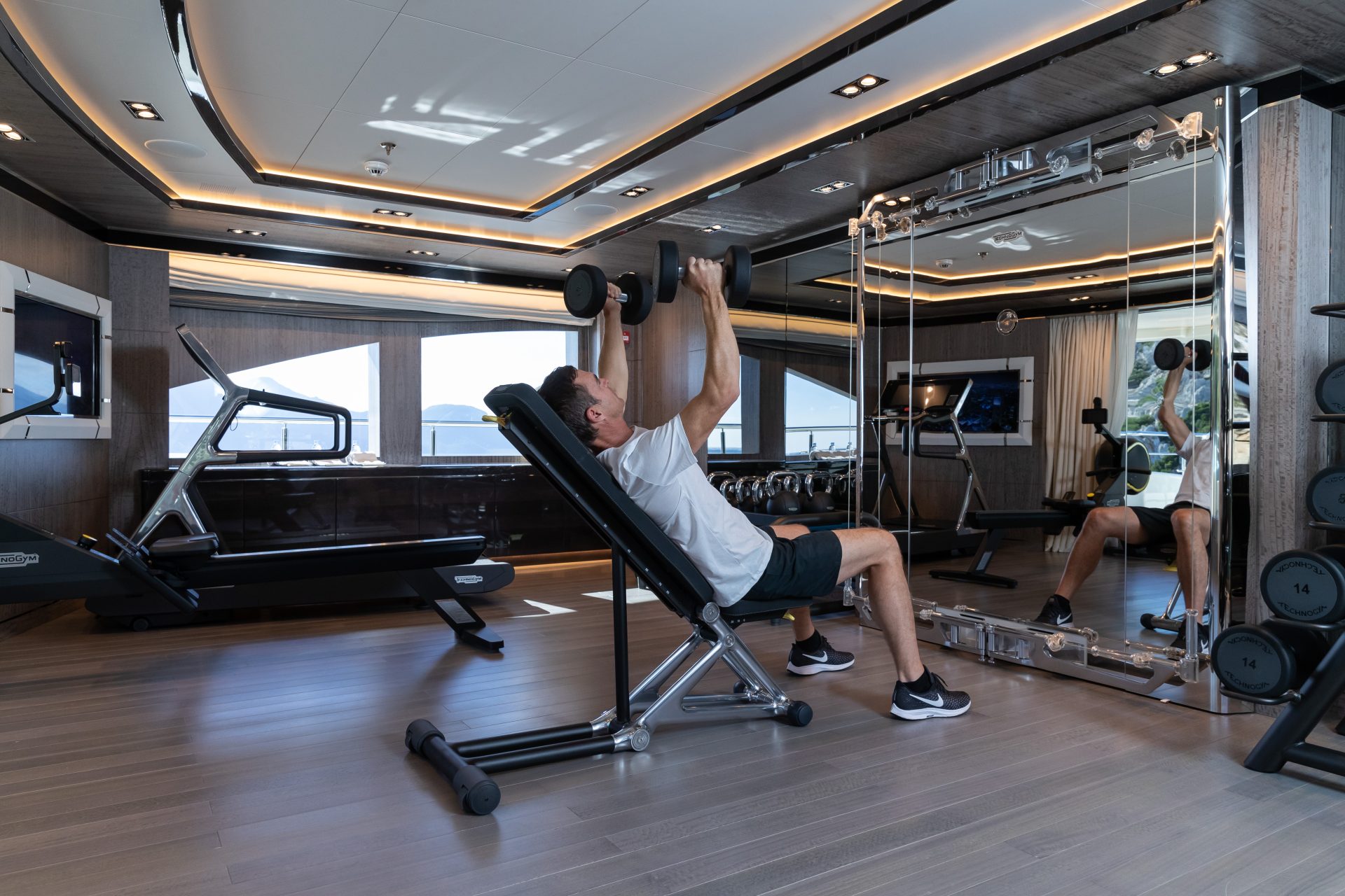 Man working out onboard superyacht