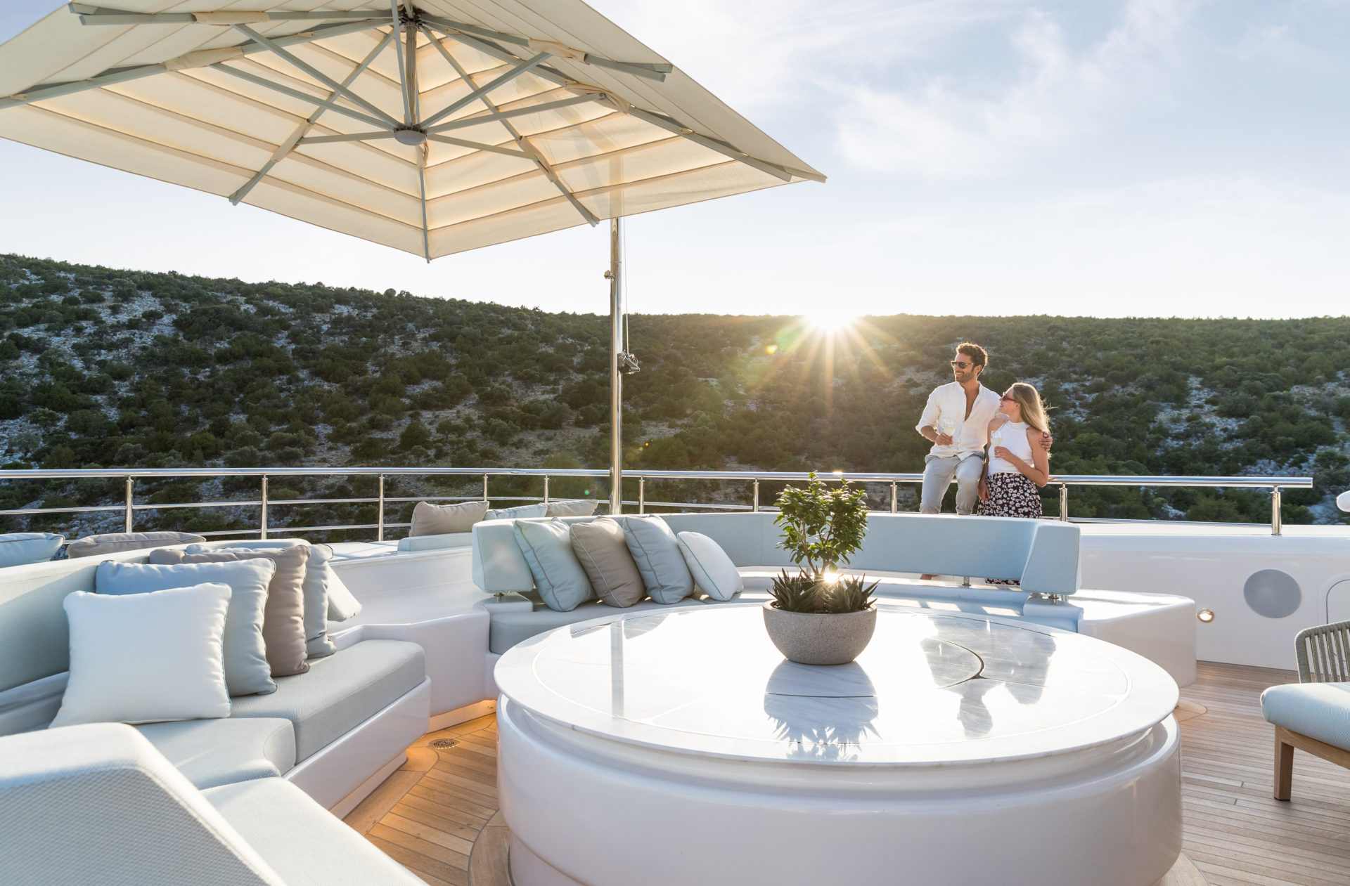 Couple on superyacht Opari Golden Yachts Atalanta