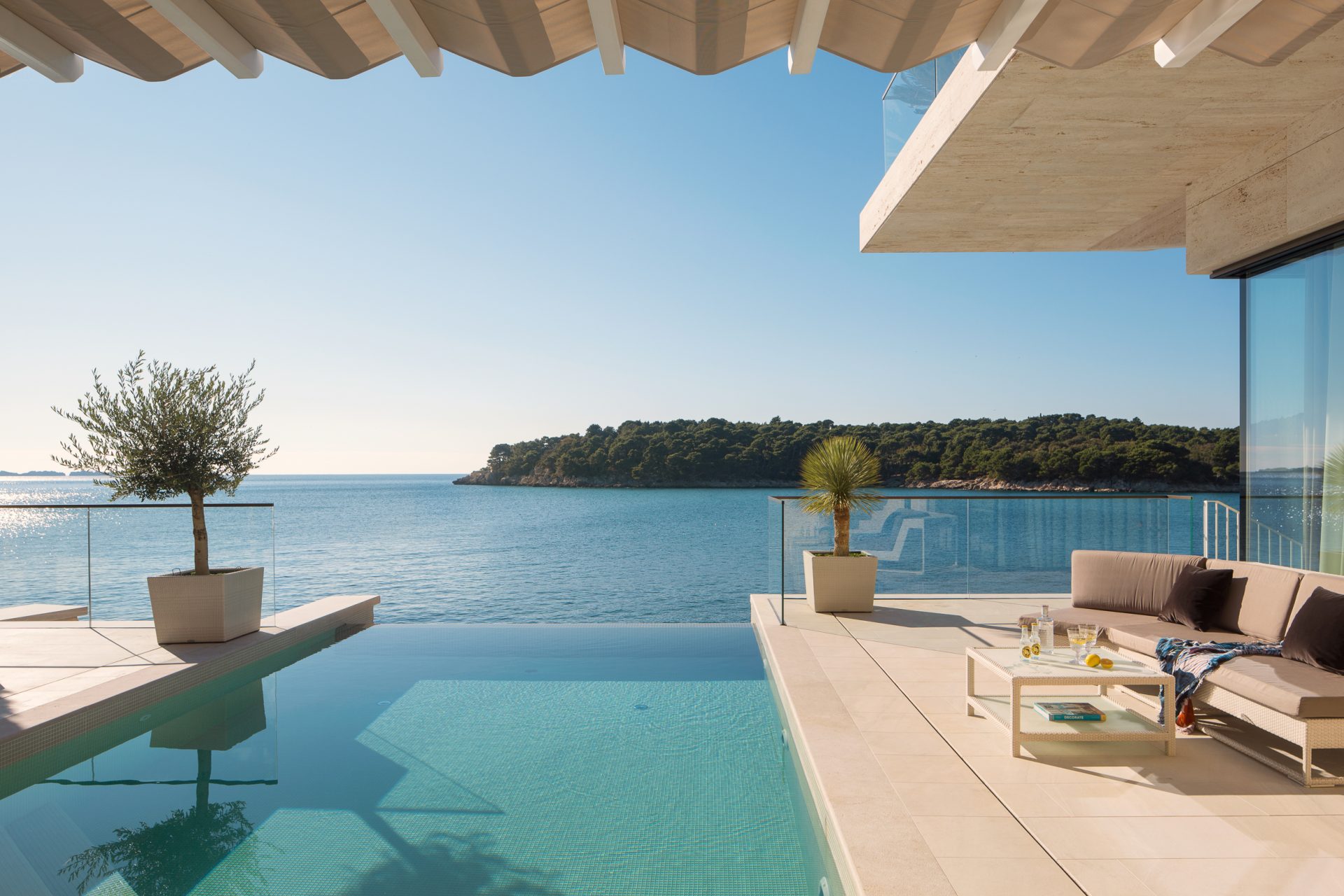 Luxury villa with infinity pool overlooking coast